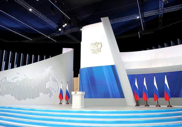 empty stage with flags and podium