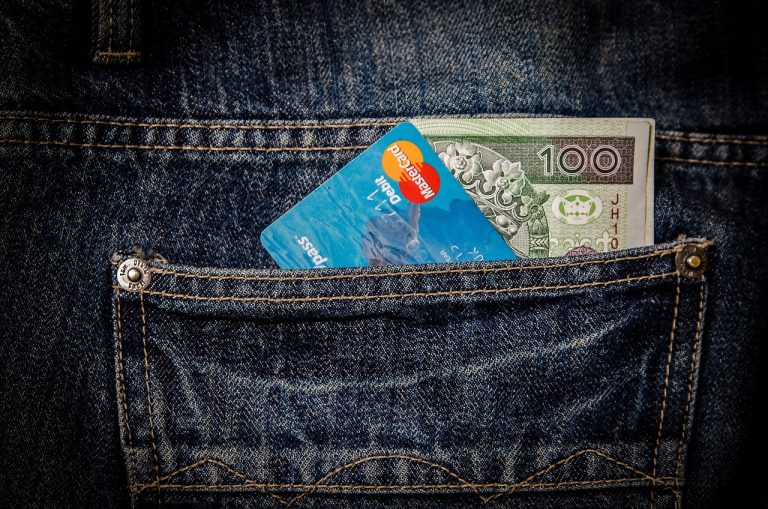 Money, card, pocket — Managing Debt with an IVA: How an IP Can Help You Reach a Settlement