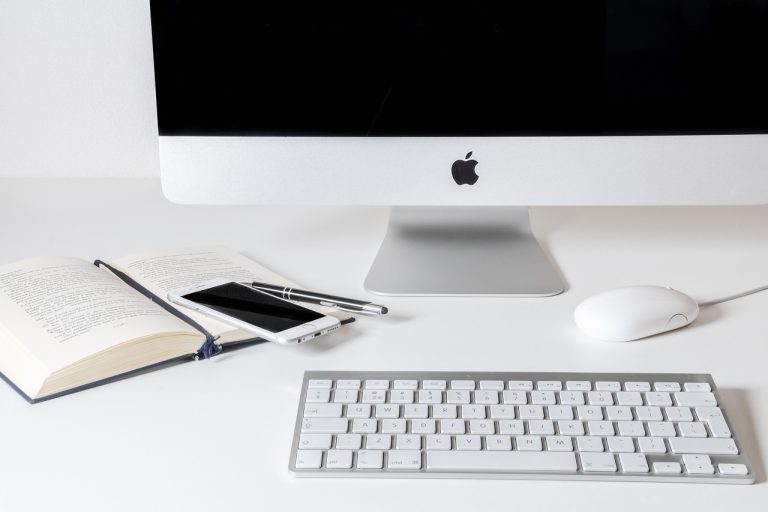 Work, computer, apple — Simplify Travel Transactions with Reliable Merchant Accounts